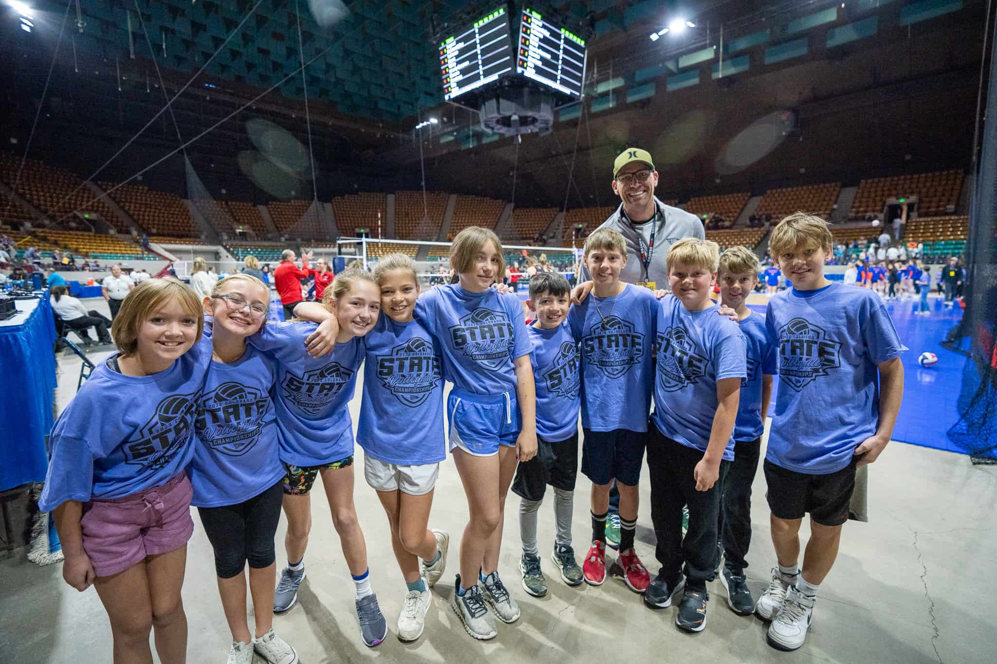 Students from Longmont Estates get ready to shag volleyballs for the State Tournament
